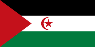 The flag of Western Sahara has three equal horizontal stripes of black, white, and green overlaid by a red triangle issuing from the hoist. Centered in the white band is a red fly-facing crescent surrounding a red five-pointed star.